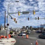 new asphalt, sidewalks, curb, gutter, handicap ramps and signal posts at the intersection of Belair Rd and Port St