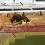 Overhead view of a Gradall excavating dirt at the Camden Yards ball field